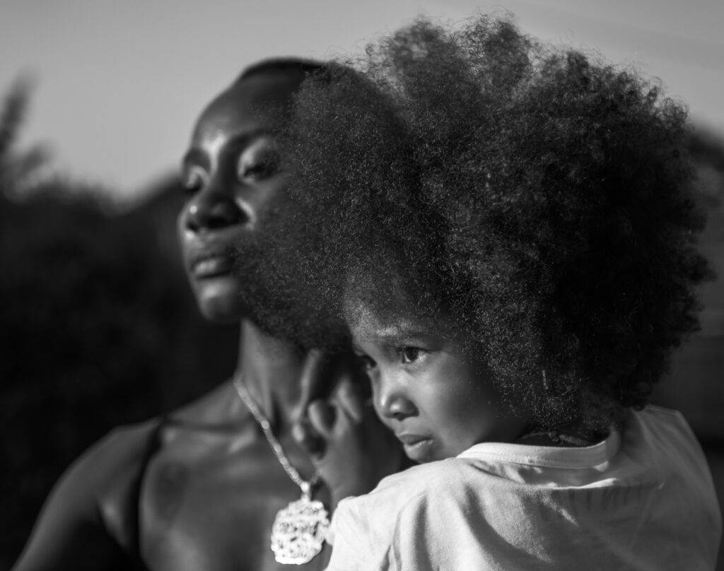 Divorce without spouse consent . A photo of an African mother and their child