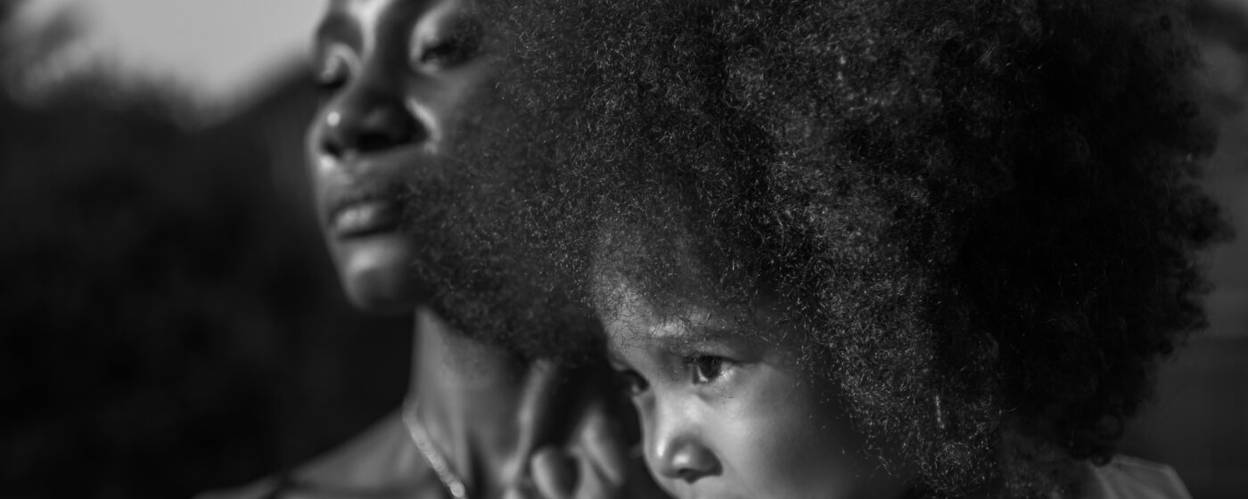 Divorce without spouse consent . A photo of an African mother and their child